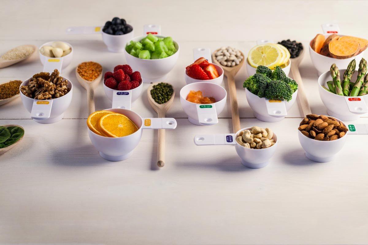 Bowls of fruit, vegetables and other foods